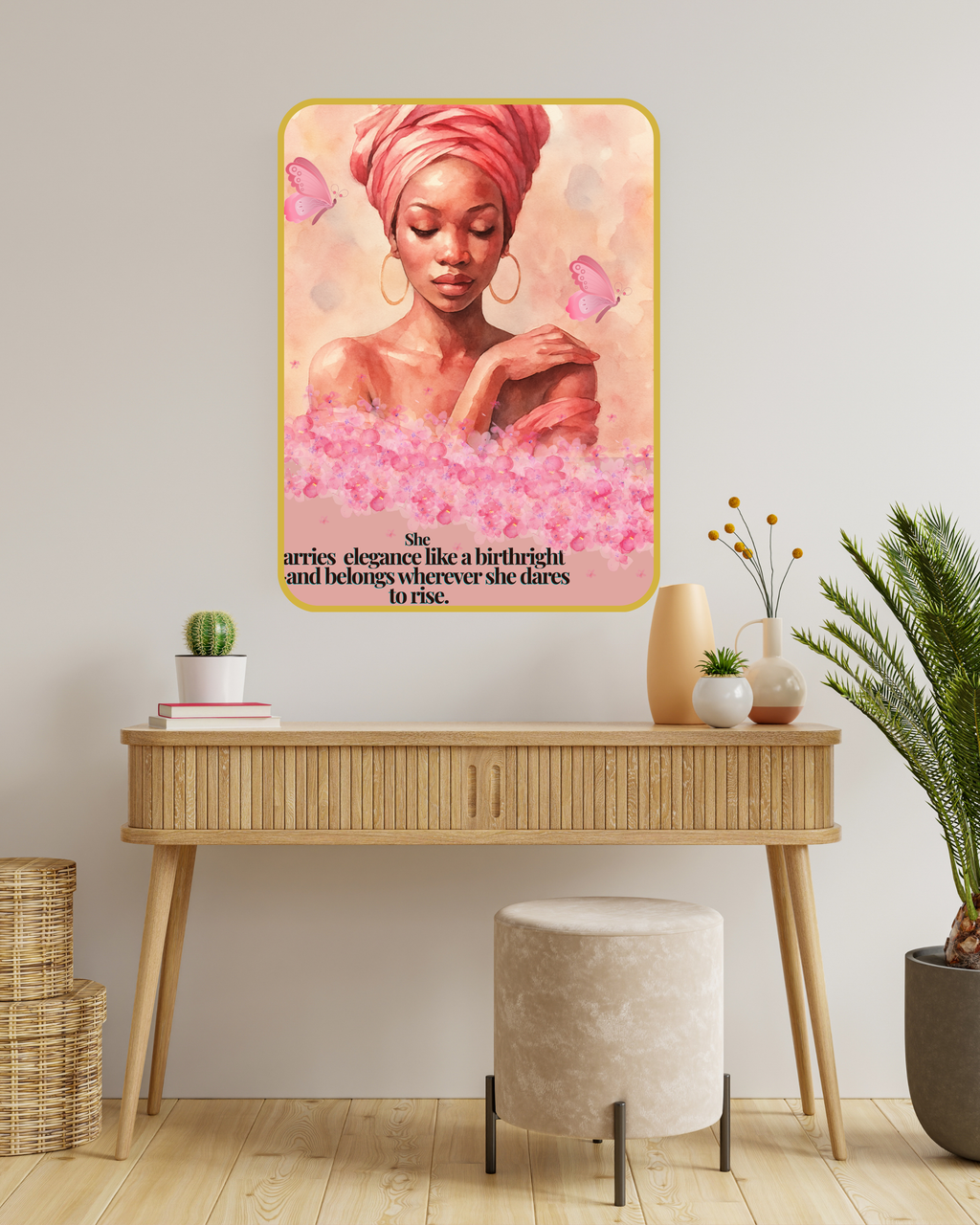 Decorative wall art of a woman with a pink turban in a room with a desk and plants.